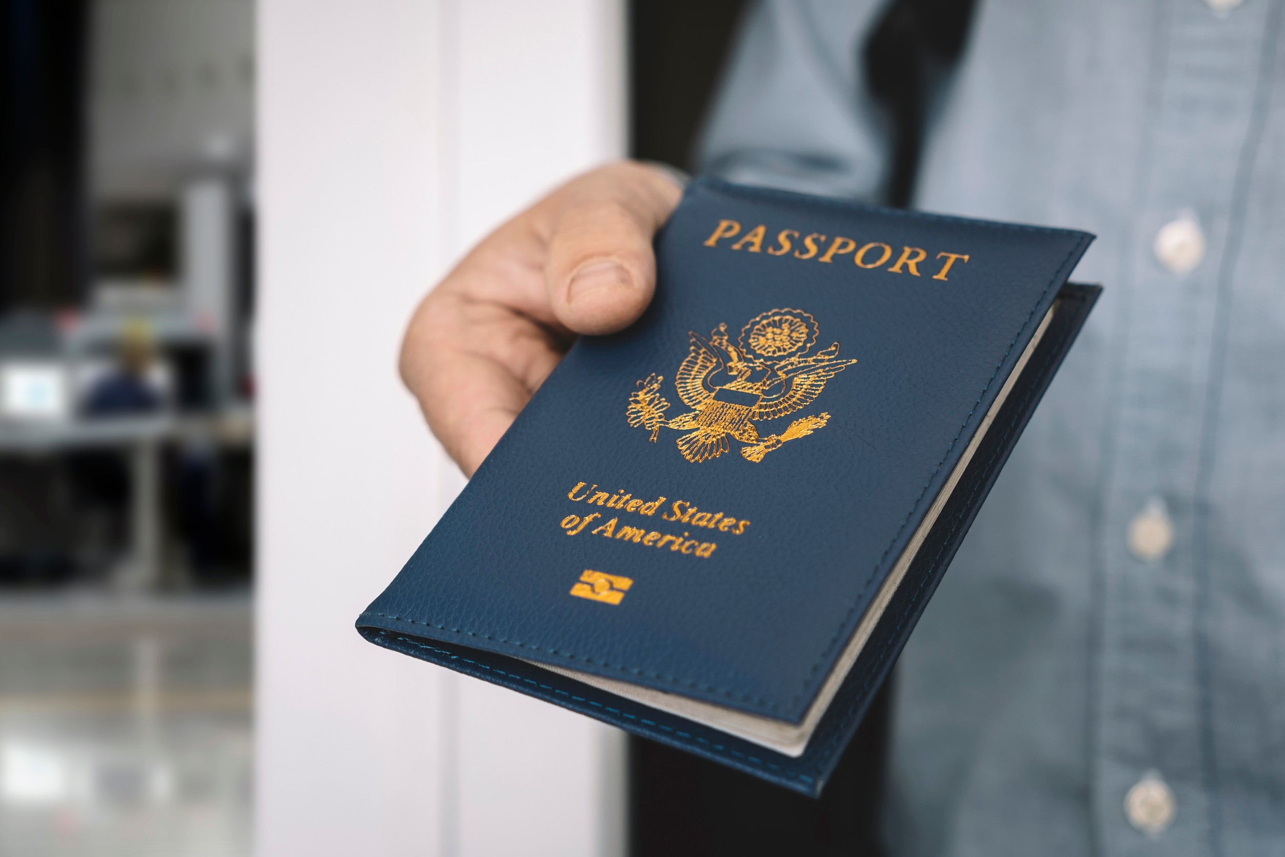 Hand Holding Passport With Bokeh Background Jorney And Travel Concept Passport Check At The Border