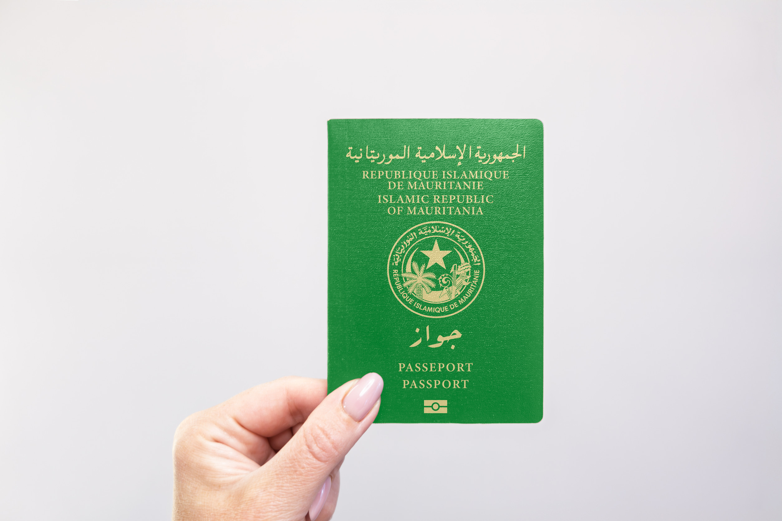 Mauritania Passport Held In Hand