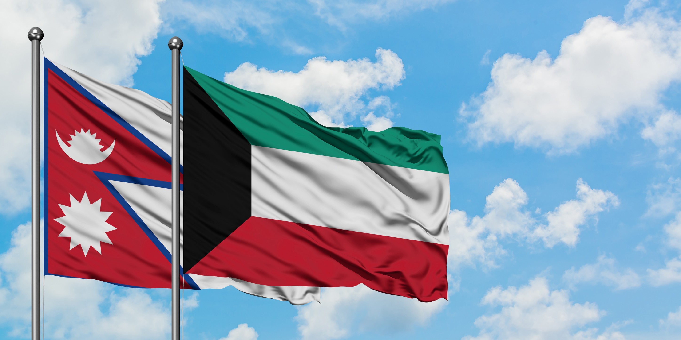 Nepal And Kuwait Flag Waving In The Wind